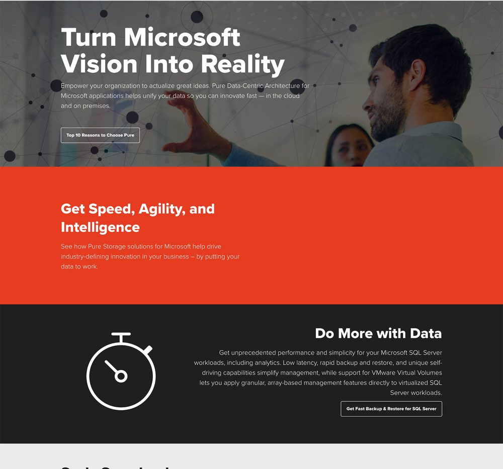 Pure Storage Microsoft solutions page in early 2019, before the template migration: a photo hero reading Turn Microsoft Vision Into Reality, then full-width orange and dark sections.